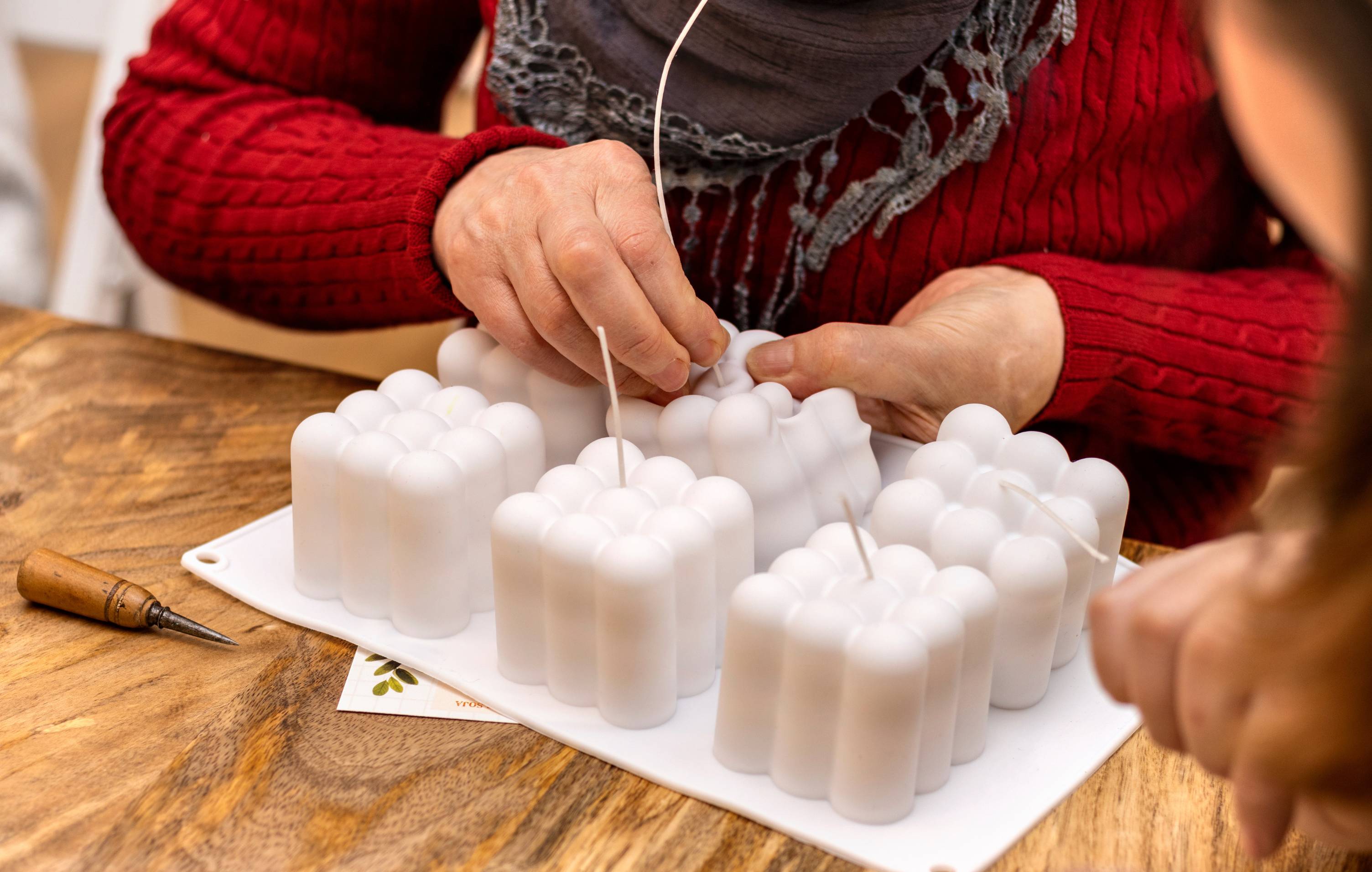 wicking a candle in a candle mould