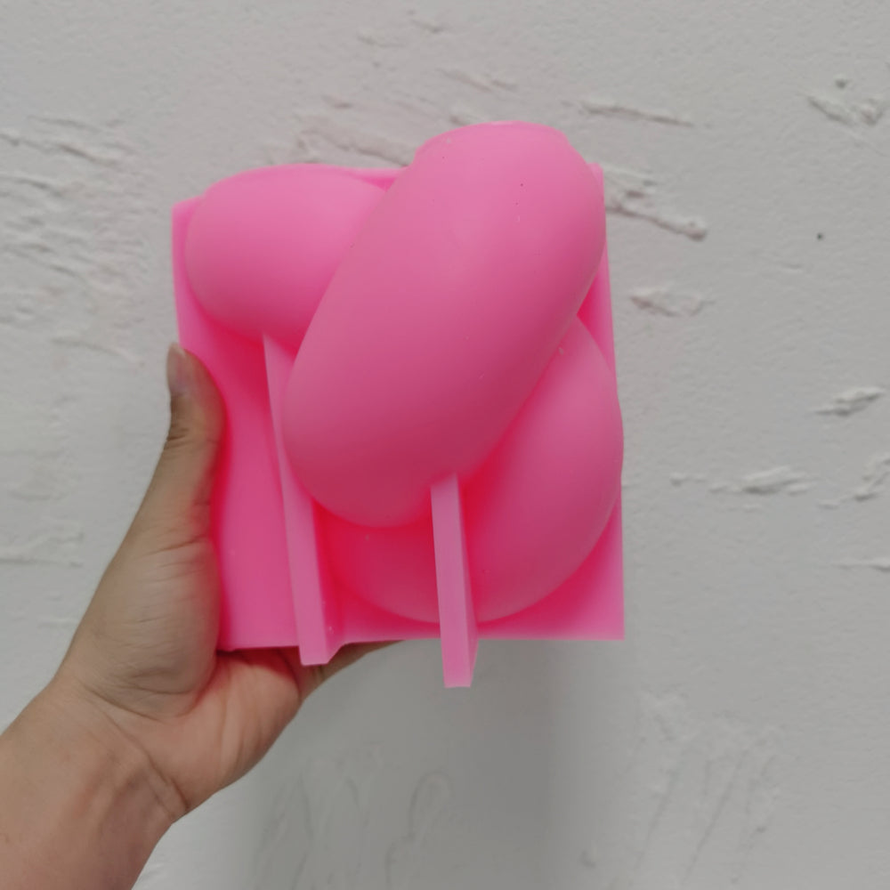 Infinity Knot Candle Mould 5 - Silicone Mould, Mold for DIY Candles. Created using candle making kit with cotton candle wicks and candle colour chips. Using soy wax for pillar candles. Sold by Myka Candles Moulds Australia