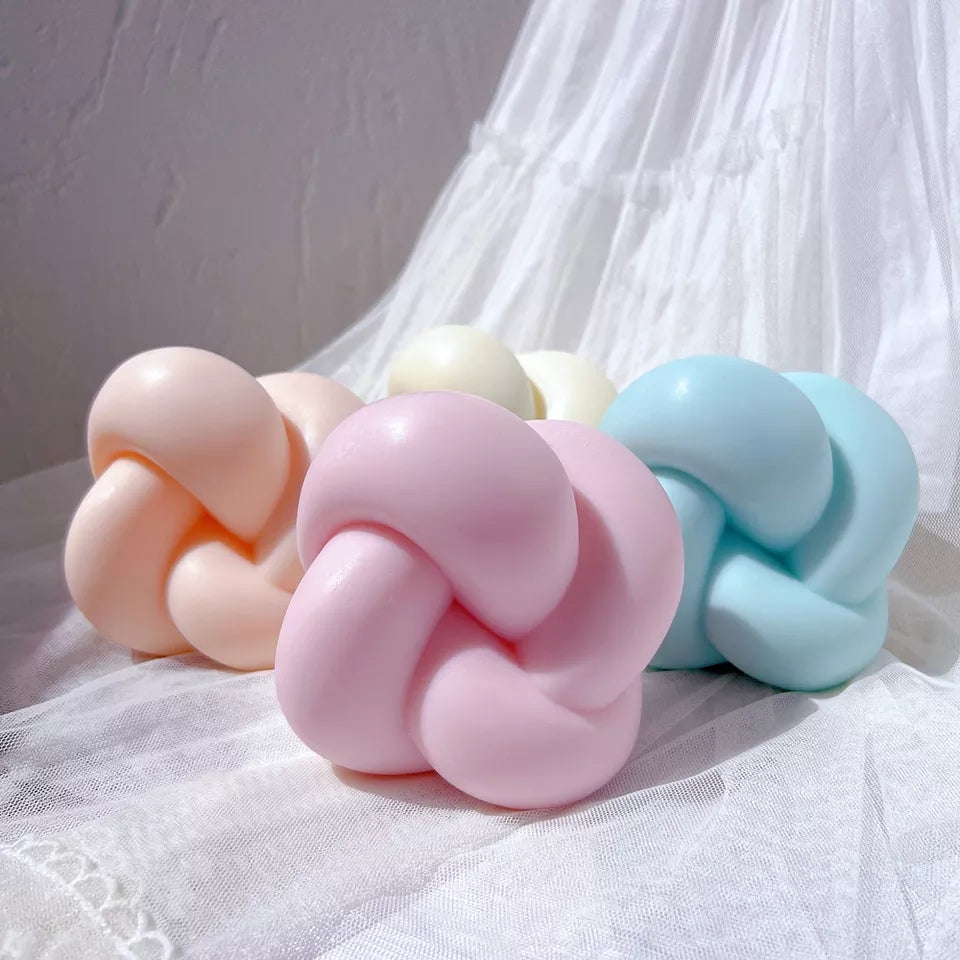 Square Knot Candle Mould 3 - Silicone Mould, Mold for DIY Candles. Created using candle making kit with cotton candle wicks and candle colour chips. Using soy wax for pillar candles. Sold by Myka Candles Moulds Australia