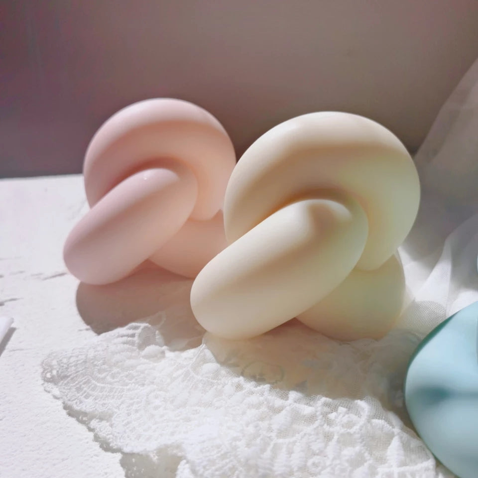 Infinity Knot Candle Mould 3 - Silicone Mould, Mold for DIY Candles. Created using candle making kit with cotton candle wicks and candle colour chips. Using soy wax for pillar candles. Sold by Myka Candles Moulds Australia