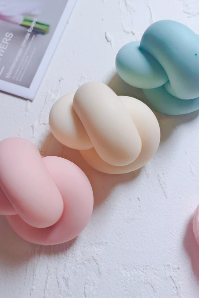Infinity Knot Candle Mould 2 - Silicone Mould, Mold for DIY Candles. Created using candle making kit with cotton candle wicks and candle colour chips. Using soy wax for pillar candles. Sold by Myka Candles Moulds Australia