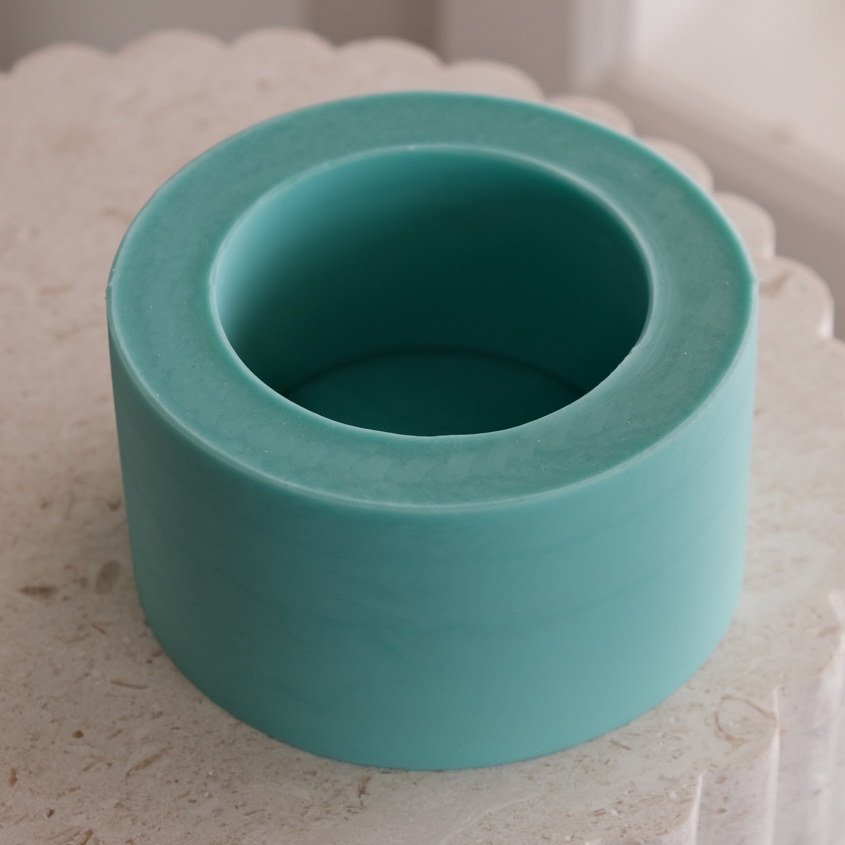 The flexible 12cm Straight Candle Jar Mould silicone candle mould by MYKA Candles and Moulds, suitable for plaster casting and candle making.