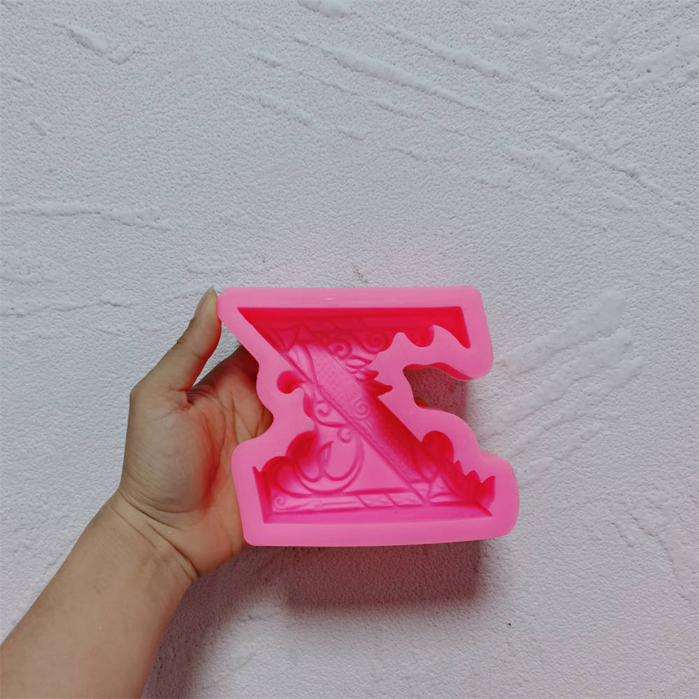 An intricate Alphabet Silicone Candle Moulds silicone candle mold by MYKA Candles and Moulds, designed for aesthetic candles and resin moulds.