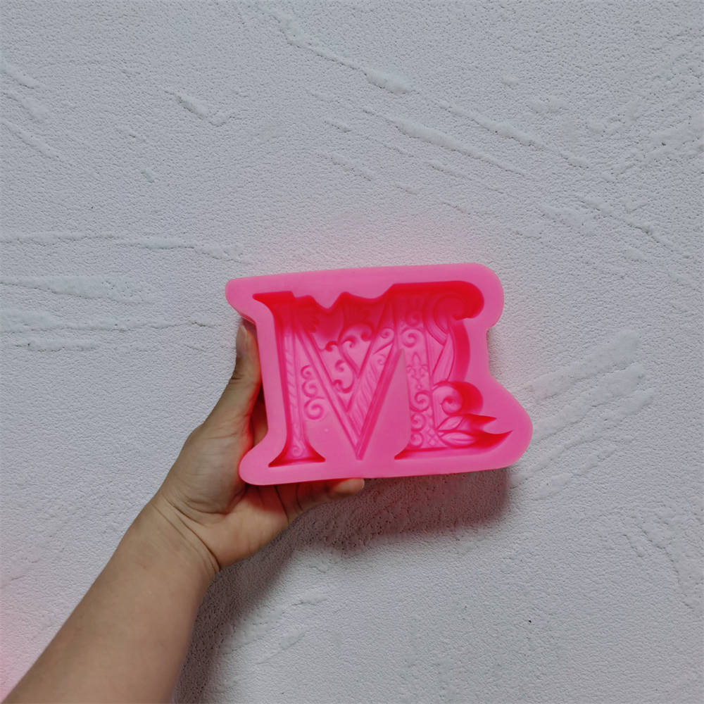 An aesthetic Alphabet Silicone Candle Moulds silicone candle mould from MYKA Candles and Moulds, perfect for soap, resin, and cake mould art.