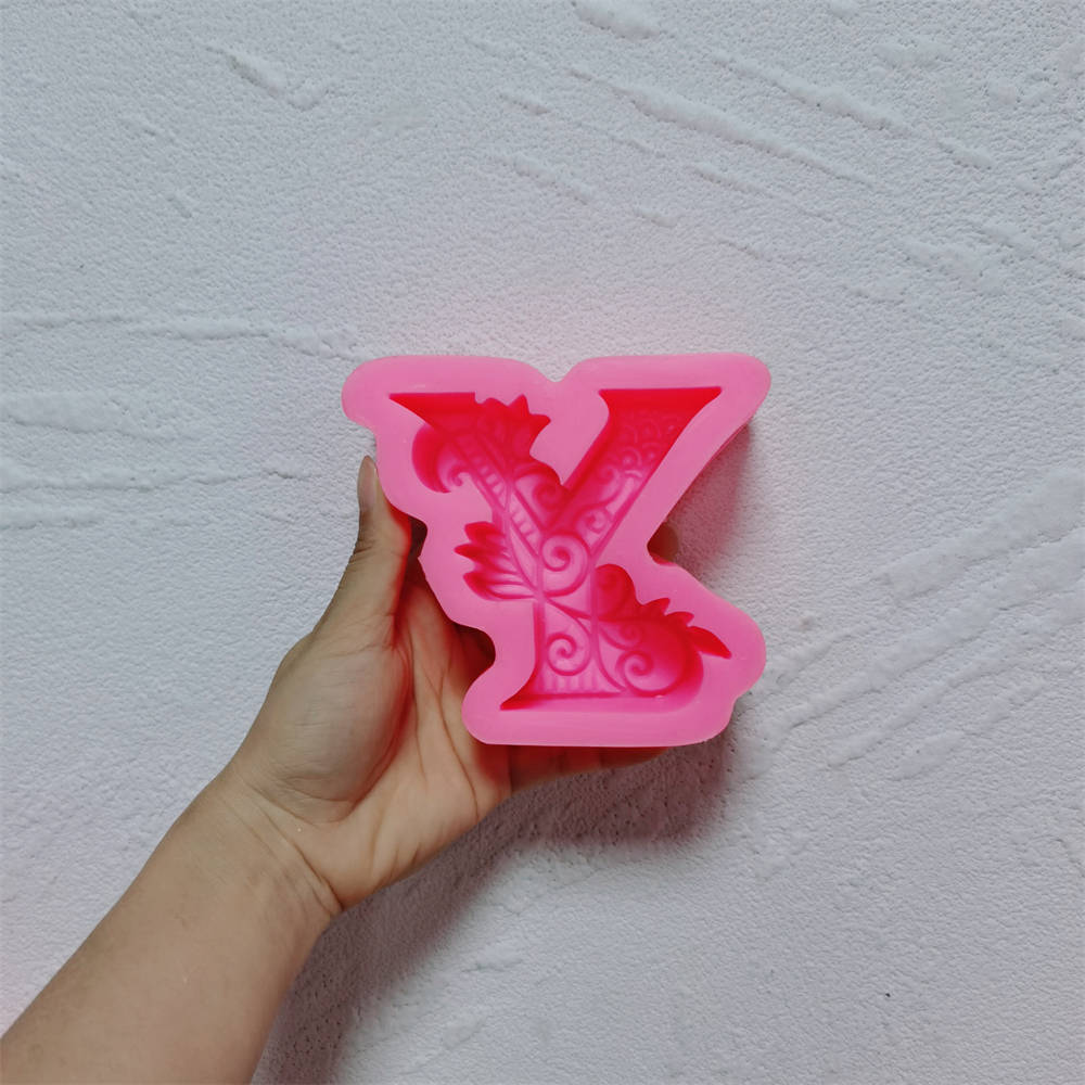 An intricate Alphabet Silicone Candle Moulds silicone candle mold by MYKA Candles and Moulds, designed for aesthetic candles and resin moulds.