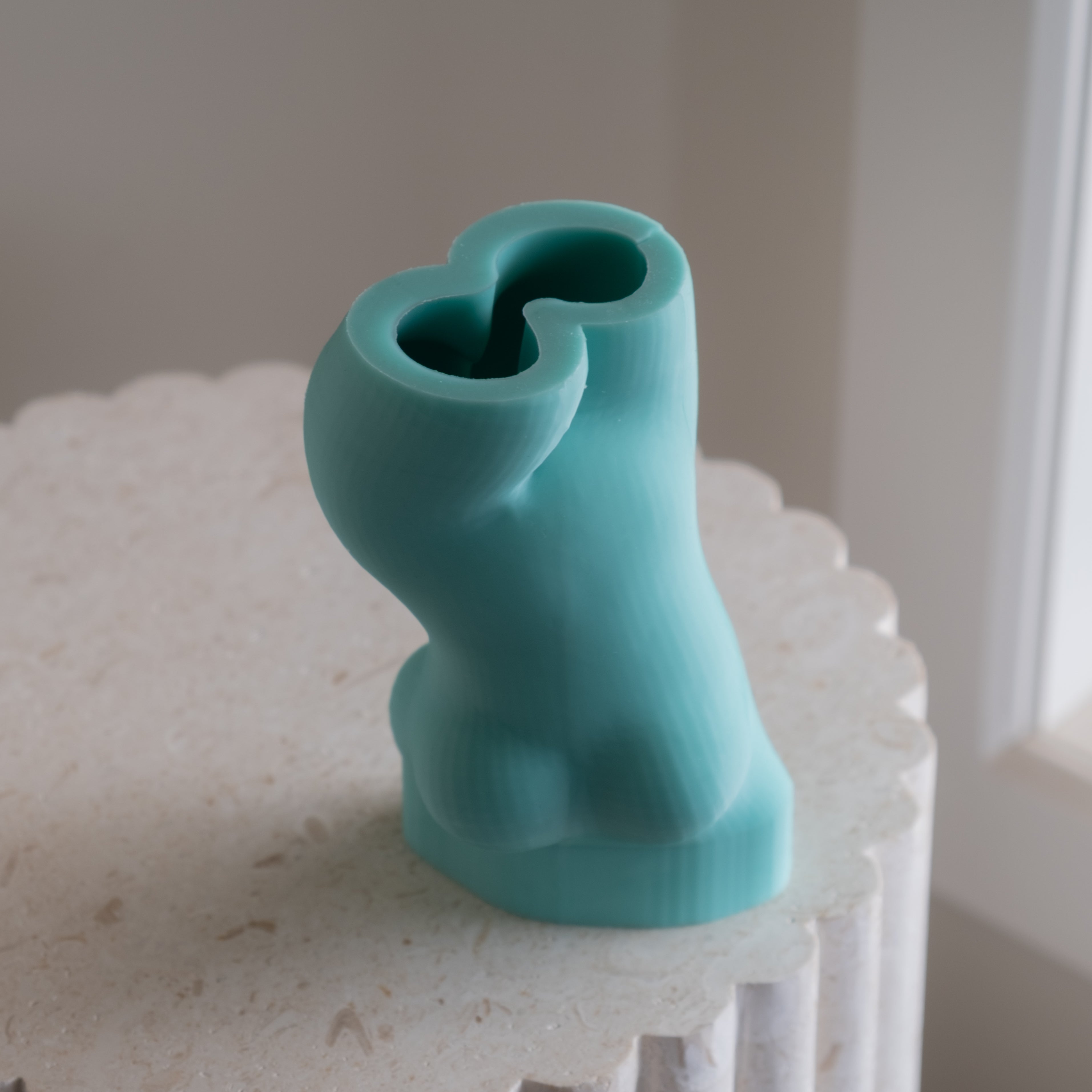 An aesthetic Aphrodite Silicone Candle Mould silicone candle mould from MYKA Candles and Moulds, perfect for soap, resin, and cake mould art.