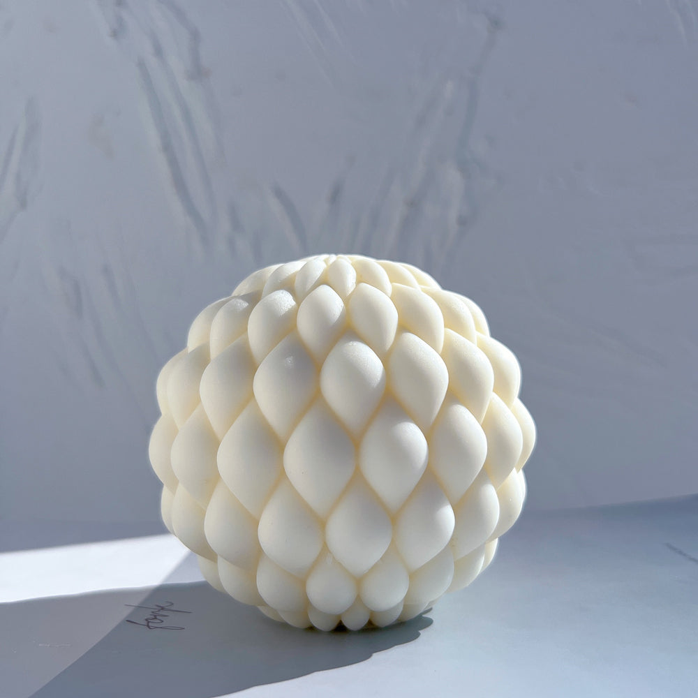 A Braid Orb Candle Mould silicone candle mold by MYKA Candles and Moulds, designed for easy release in soap, resin, and cake mould casting.