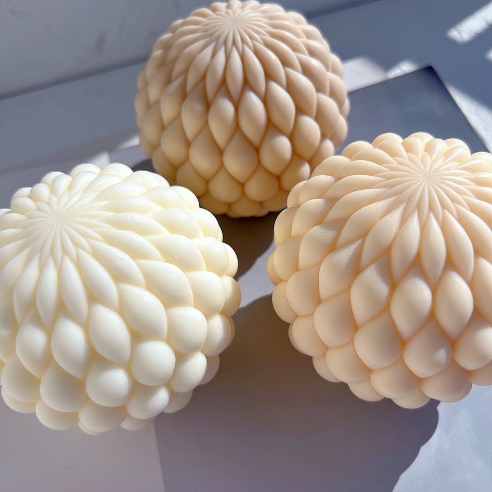 An aesthetic Braid Orb Candle Mould silicone candle mould from MYKA Candles and Moulds, perfect for soap, resin, and cake mould art.