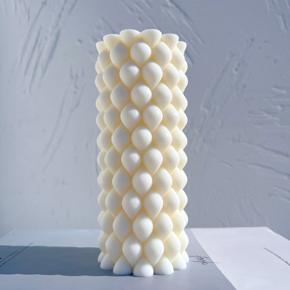 The flexible Braid Pillar Candle Mould silicone candle mould by MYKA Candles and Moulds, suitable for soap moulds and food-grade cake mould use.