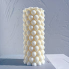 The flexible Braid Pillar Candle Mould silicone candle mould by MYKA Candles and Moulds, suitable for soap moulds and food-grade cake mould use.