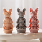 A heat-resistant Bunny Trio Candle Mould silicone candle mould by MYKA Candles and Moulds, ideal for soap, resin, and baking mould applications.