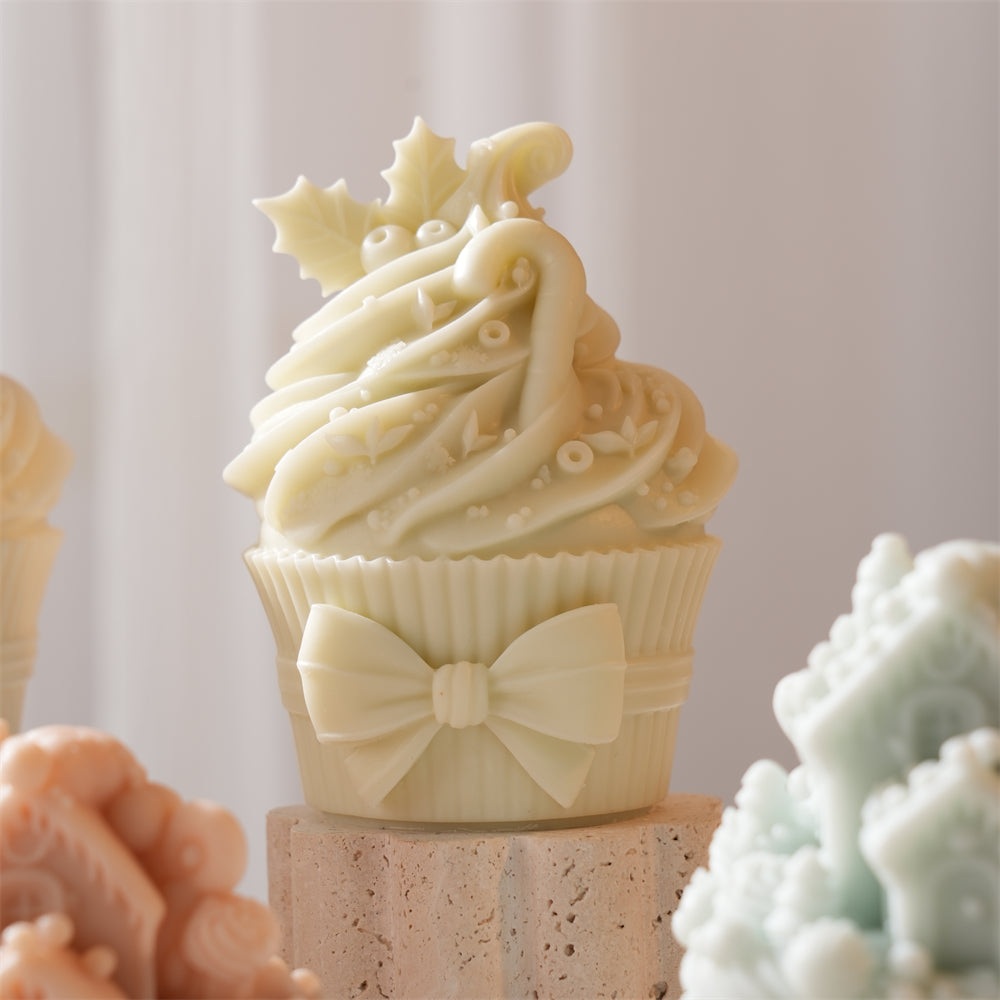 An intricate Christmas Cupcake Silicone Candle Mould silicone candle mold by MYKA Candles and Moulds, designed for aesthetic candles and resin moulds.