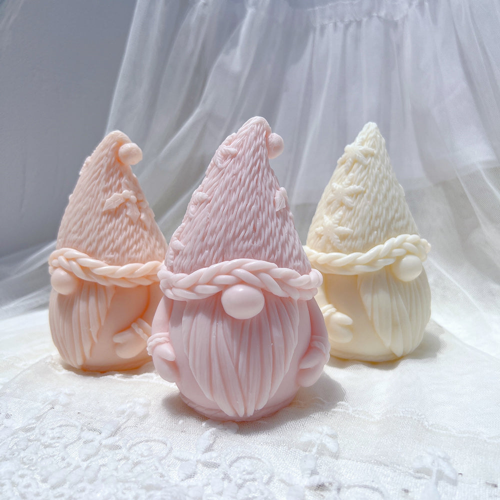 A heat-resistant Christmas Gnome Candle Mould silicone candle mould by MYKA Candles and Moulds, ideal for soap, resin, and baking mould applications.