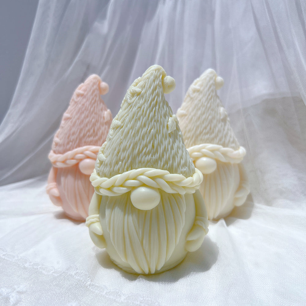 A heat-resistant Christmas Gnome Candle Mould silicone candle mould by MYKA Candles and Moulds, ideal for soap, resin, and baking mould applications.