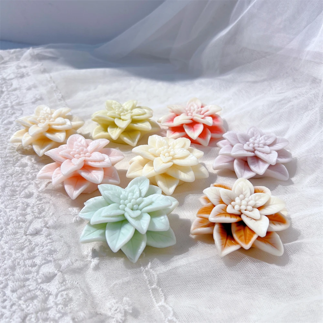 The Christmas Poinsettia Silicone Candle Mould silicone candle mould from MYKA Candles and Moulds, a professional supply for candle, soap, and baking moulds.