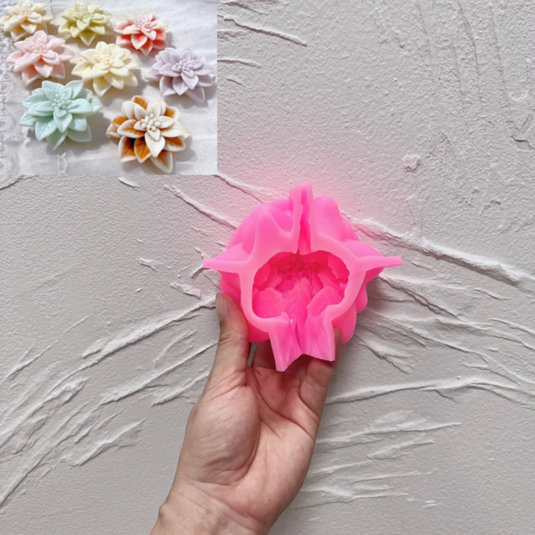 A heat-resistant Christmas Poinsettia Silicone Candle Mould silicone candle mould by MYKA Candles and Moulds, ideal for soap, resin, and baking mould applications.