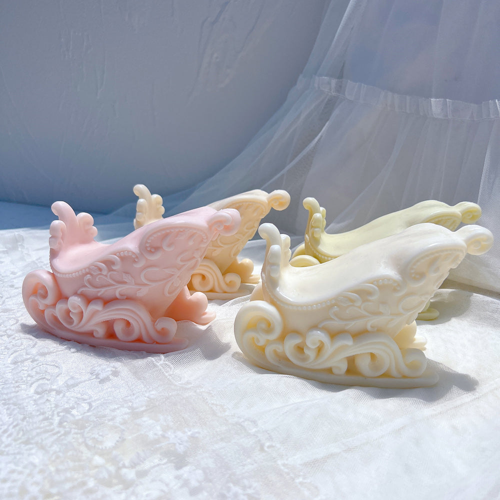 A premium Christmas Sleigh Candle Mould silicone candle mold by MYKA Candles and Moulds, a versatile tool for soap, resin, and cake mould crafting.