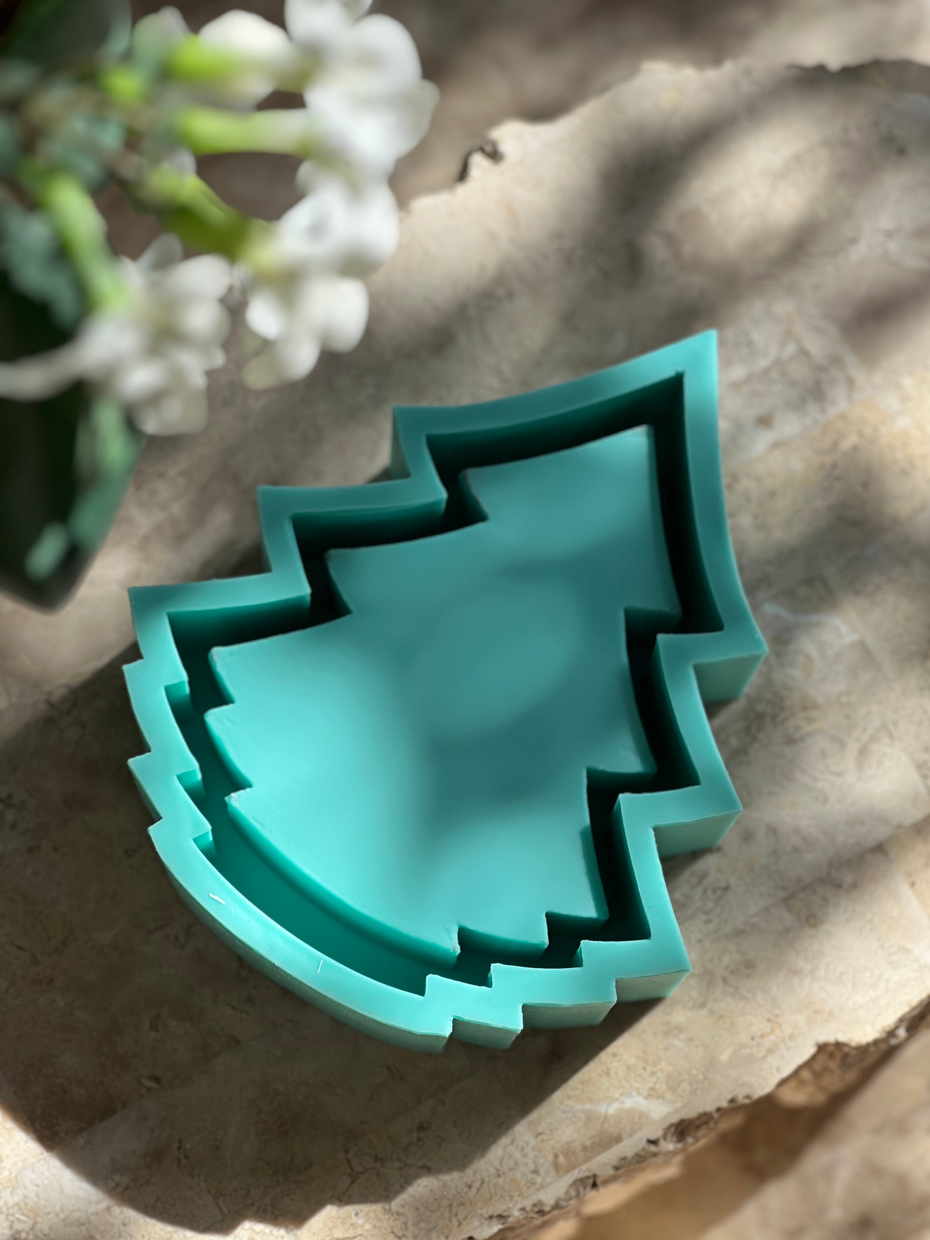 A high-performance Christmas Tree Vessel Mould silicone candle mold from MYKA Candles and Moulds for resin art and vessel making.