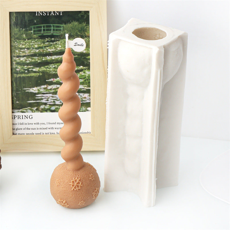 The Christmas Twisted Pillar Silicone Candle Moulds silicone candle mould by MYKA Candles and Moulds, a top choice for artistic resin moulds and baking moulds.