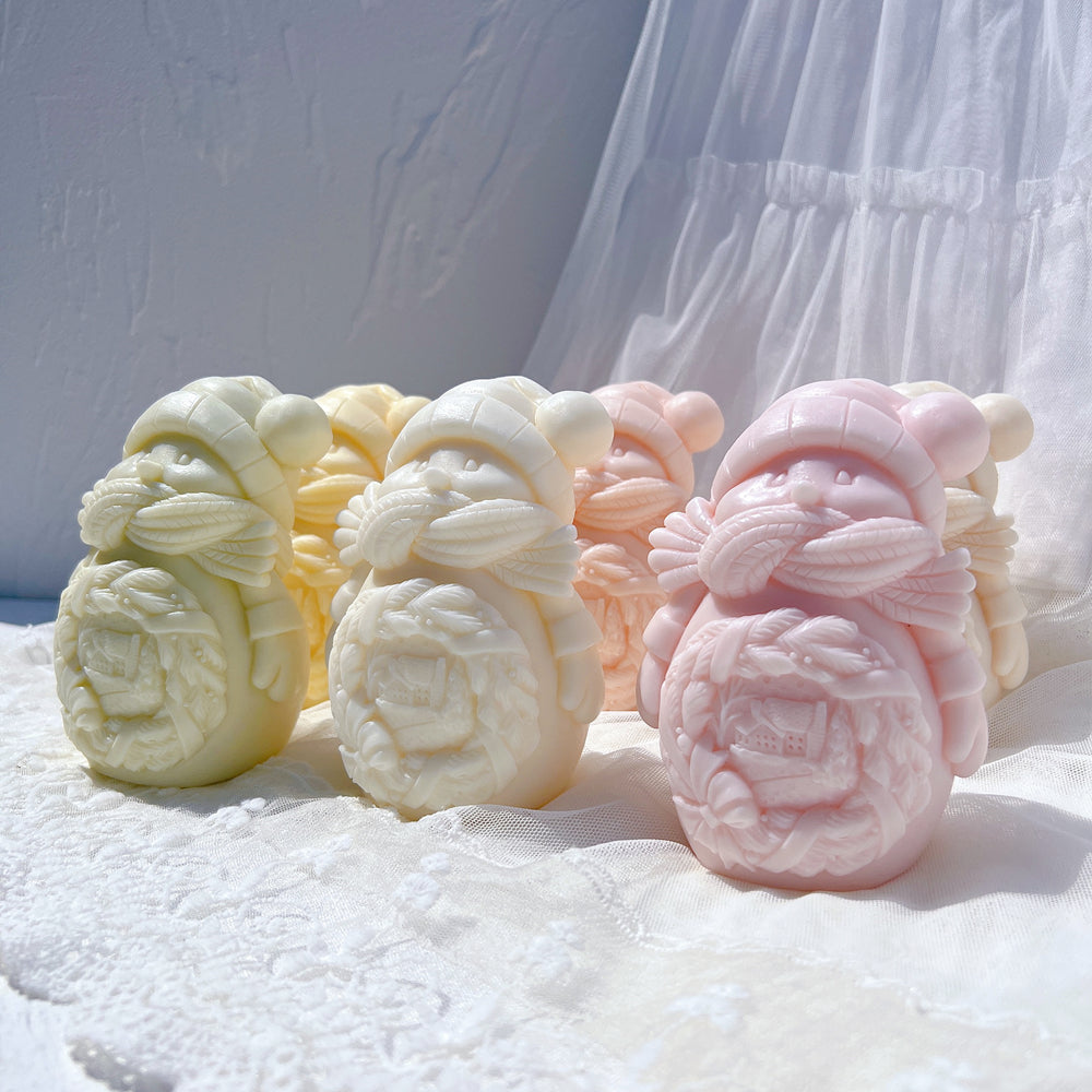 Close-up of the Cozy Snowman Candle Mould silicone candle mould by MYKA Candles and Moulds for soy wax, soap moulds, and baking mould hobbyists.