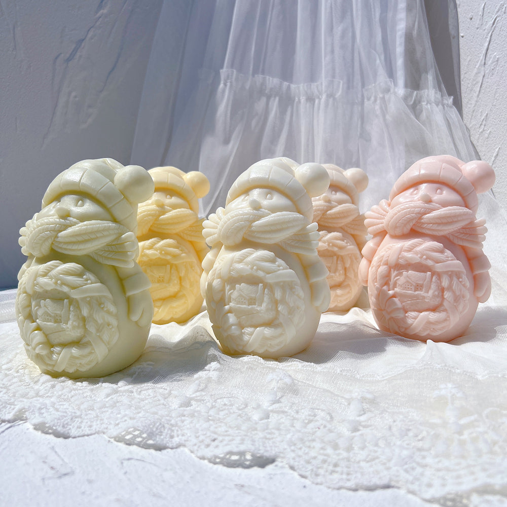 A heat-resistant Cozy Snowman Candle Mould silicone candle mould by MYKA Candles and Moulds, ideal for soap, resin, and baking mould applications.