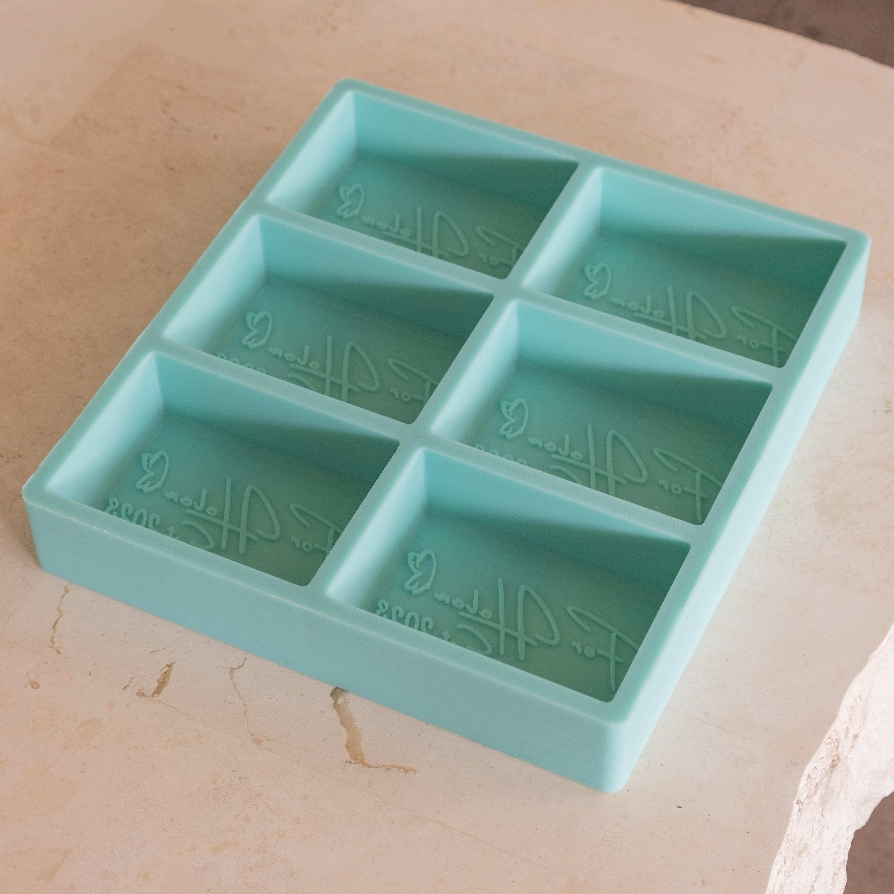 A heat-resistant Customisable Multi-Cavity Soap Candle Mould silicone candle mould by MYKA Candles and Moulds, ideal for soap, resin, and baking mould applications.