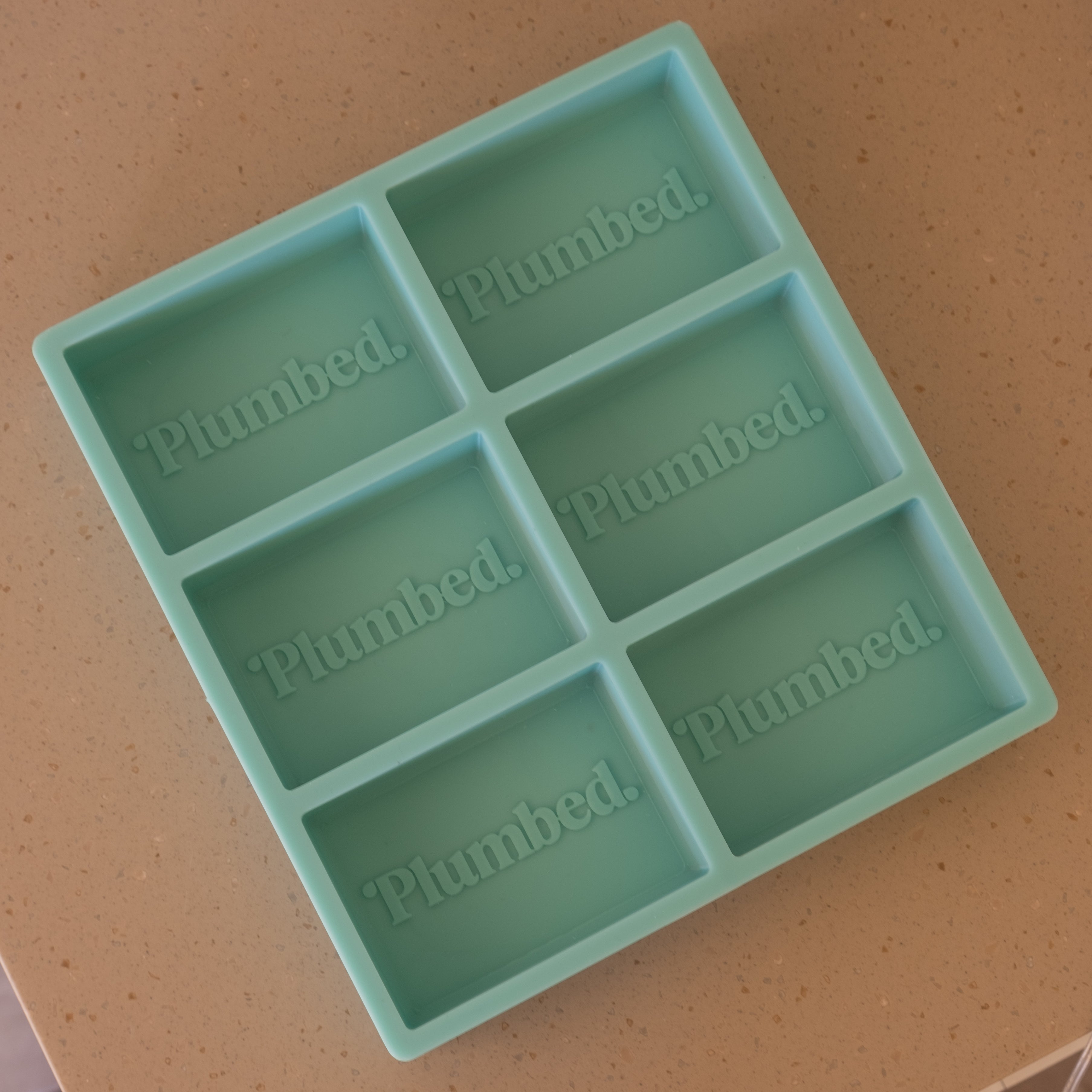 A high-performance Customisable Multi-Cavity Soap Candle Mould silicone candle mold from MYKA Candles and Moulds for resin art and professional baking mould use.