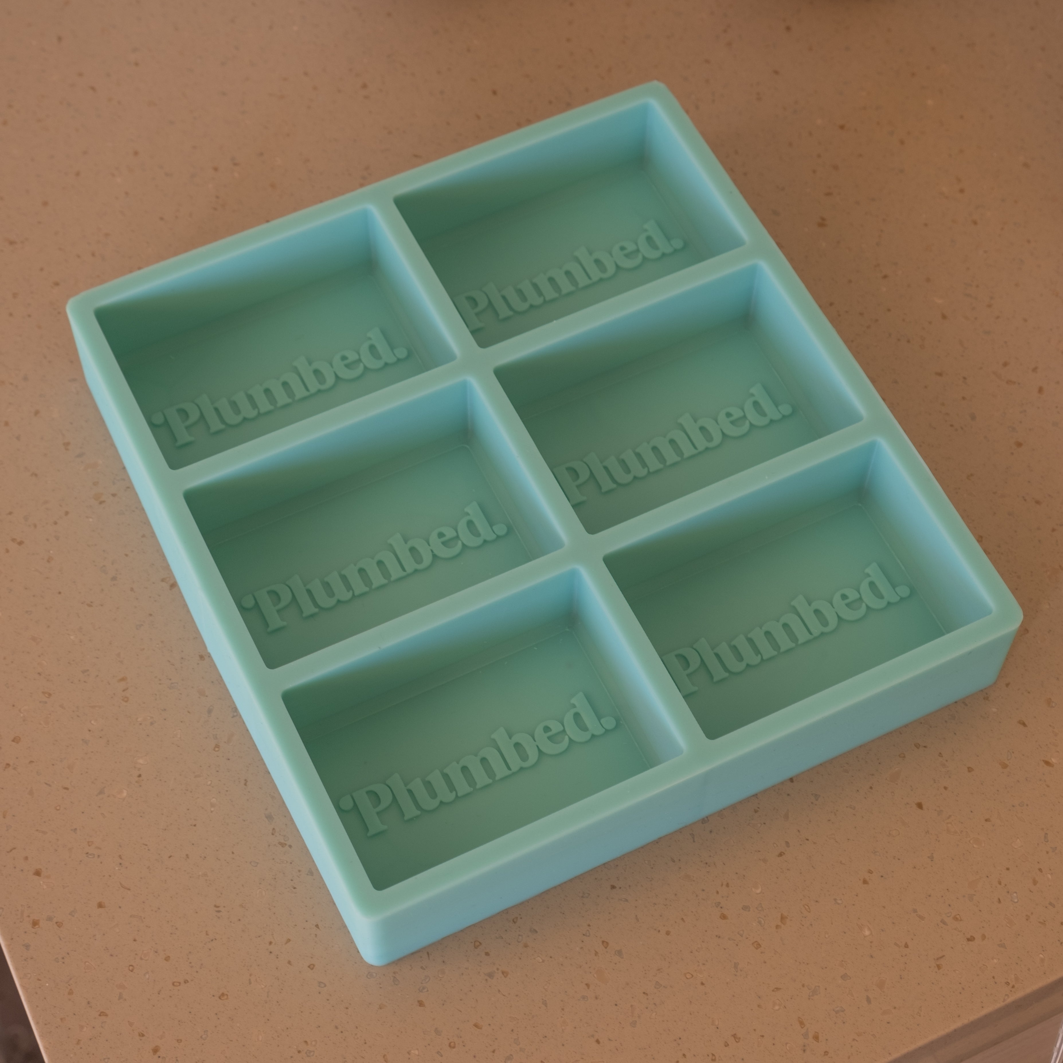 The Customisable Multi-Cavity Soap Candle Mould silicone candle mold by MYKA Candles and Moulds, featuring high detail for candle, soap, and baking moulds.
