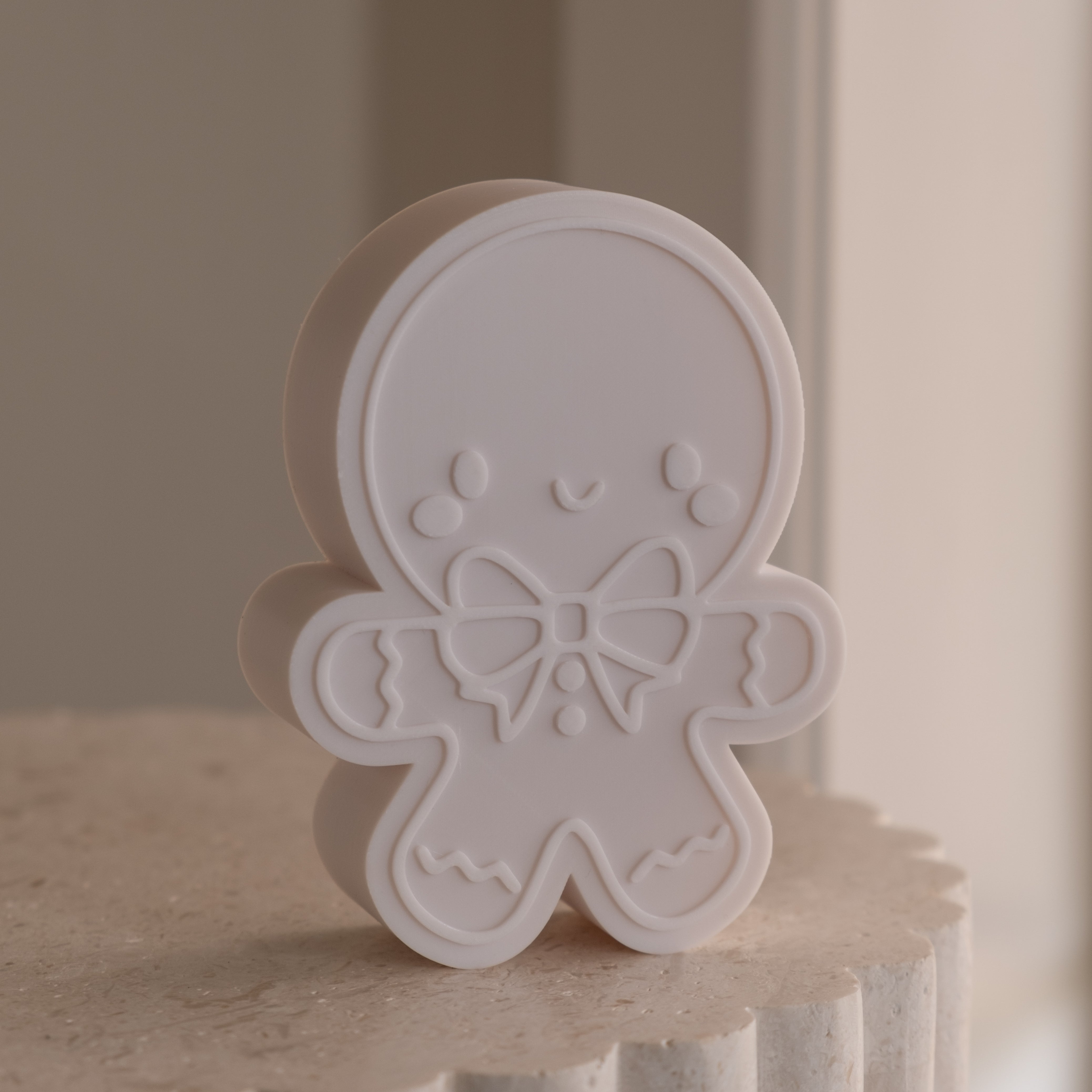 An intricate Cute Gingerbread Man Candle Mould silicone candle mold by MYKA Candles and Moulds, designed for aesthetic candles and resin moulds.