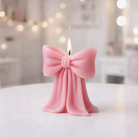 The Draped Bow Pillar Candle Mould silicone candle mold by MYKA Candles and Moulds, featuring high detail for candle, soap, and baking moulds.