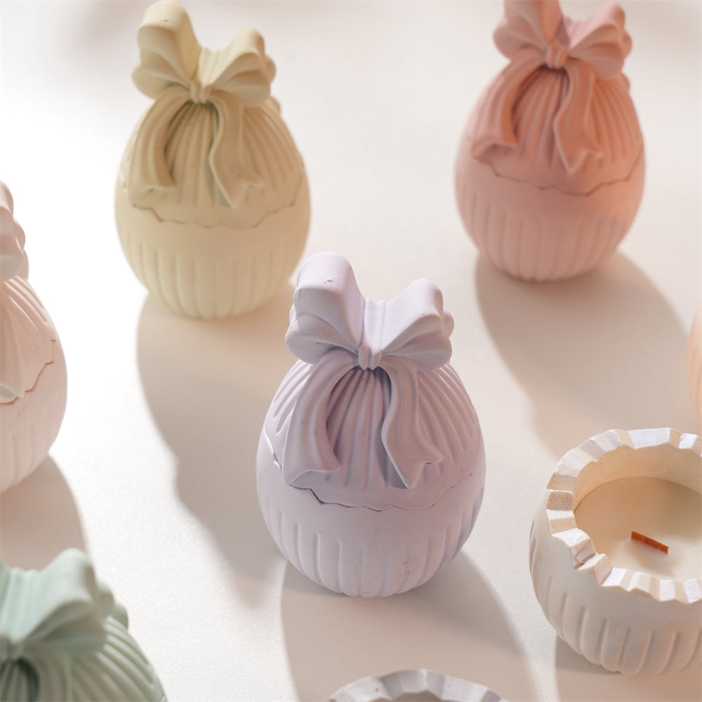 A high-performance Easter Bow Egg Vessel Mould silicone candle mold from MYKA Candles and Moulds for resin art and vessel making.