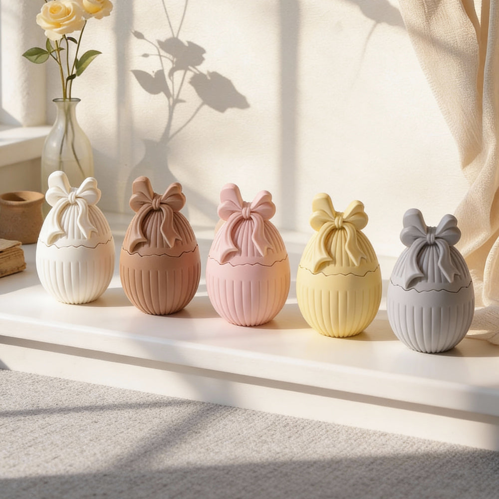 The Easter Bow Egg Vessel Mould silicone candle mould by MYKA Candles and Moulds, perfect for small business vessel and candle production.