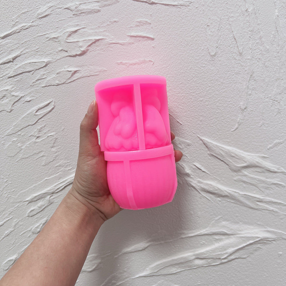 A Easter Bow Egg Vessel Mould silicone candle mold by MYKA Candles and Moulds, designed for easy release of concrete and plaster vessels.