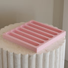 A heat-resistant Eclair Silicone Candle Mould silicone candle mould by MYKA Candles and Moulds, ideal for soap, resin, and baking mould applications.