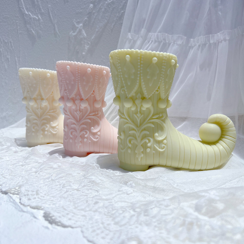 Showcasing the Elf Boot Candle Mould silicone candle mould by MYKA Candles and Moulds for creative baking moulds and candle making.