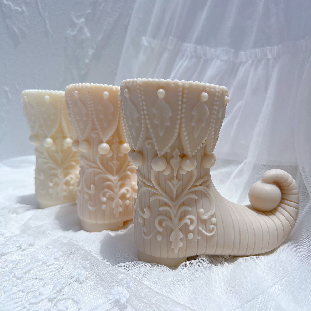 A high-performance Elf Boot Candle Mould silicone candle mold from MYKA Candles and Moulds for resin art and professional baking mould use.