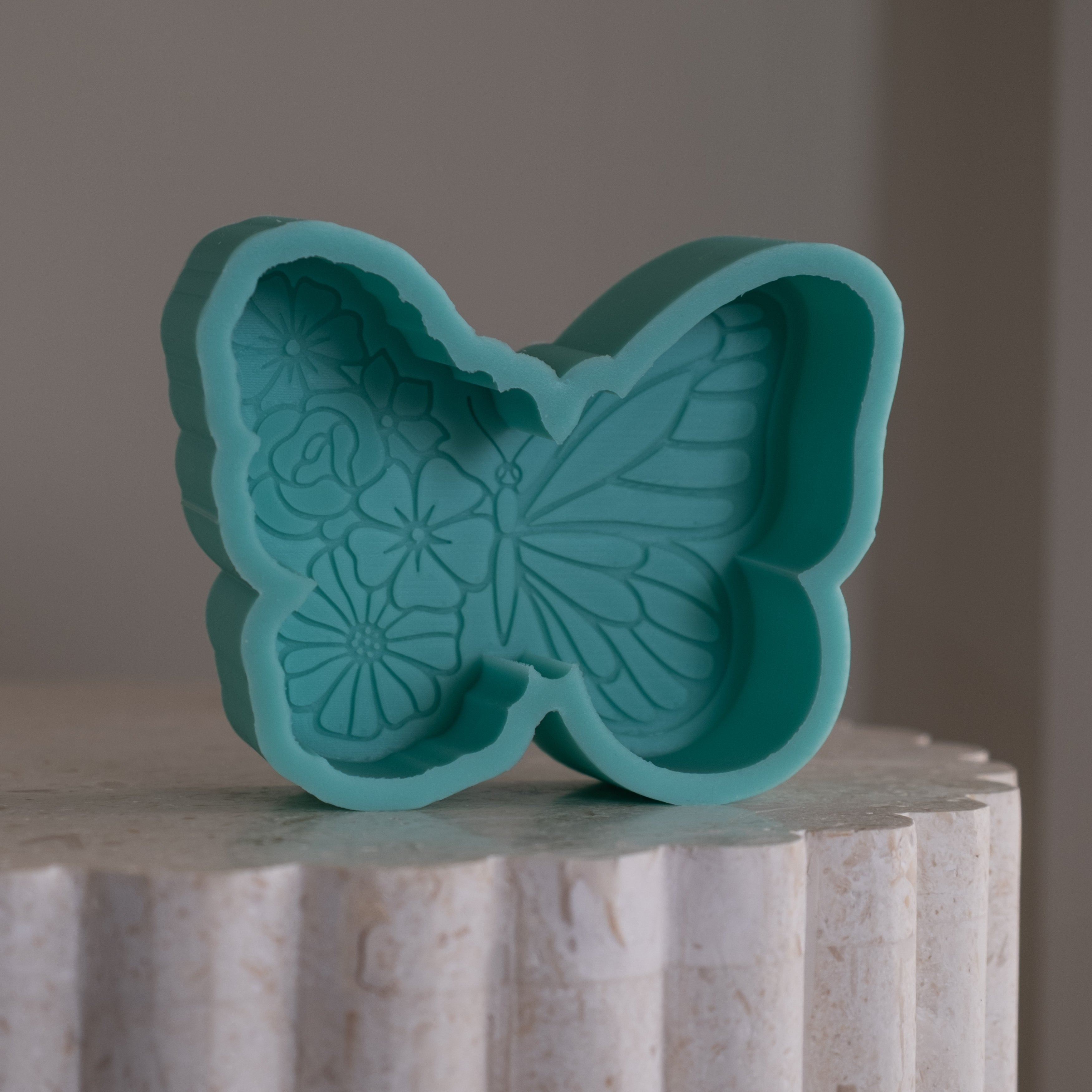 Showcasing the Floral Butterfly Candle Mould silicone candle mould by MYKA Candles and Moulds for creative baking moulds and candle making.
