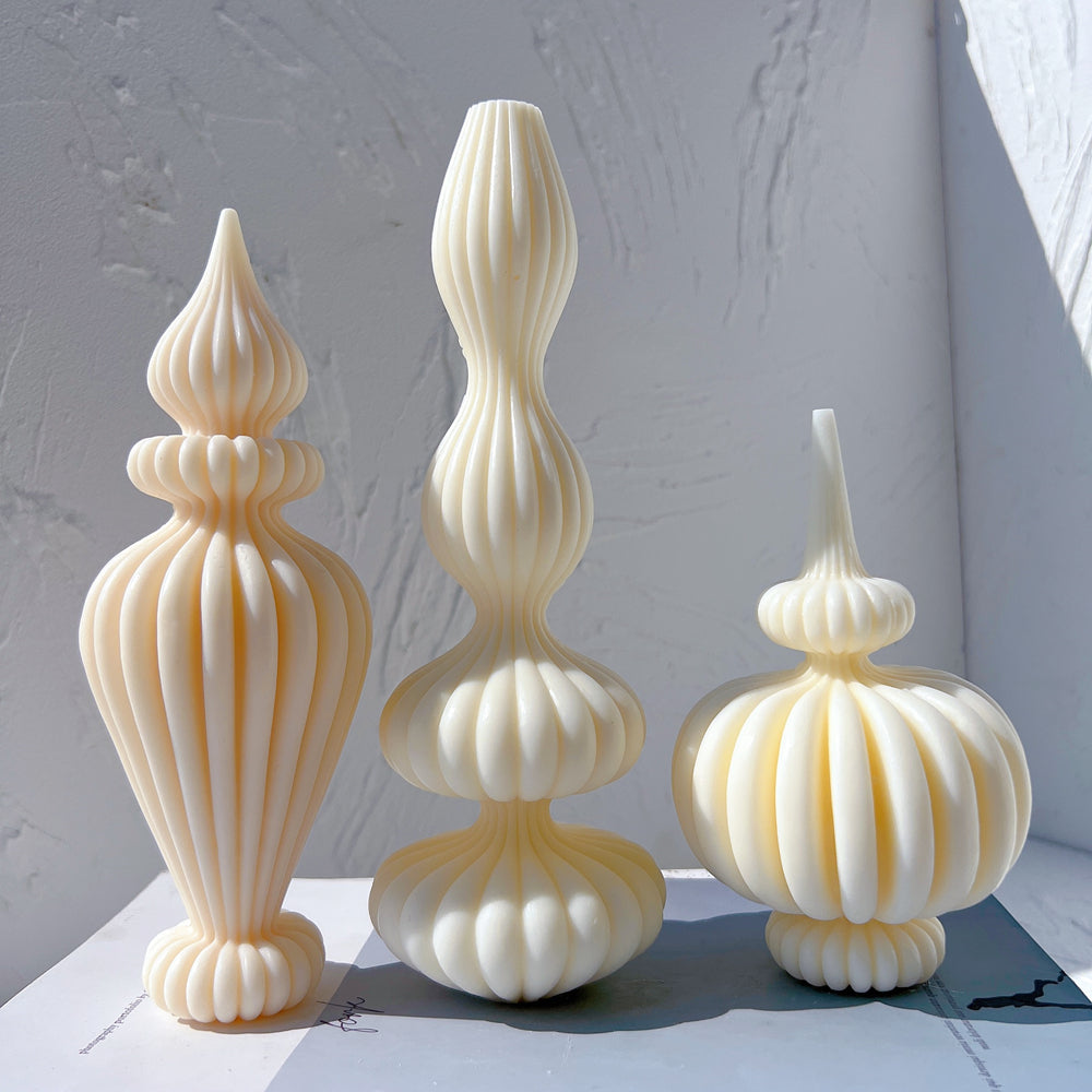 The Fluidform Ribbed Vase Moulds silicone candle mould by MYKA Candles and Moulds, a must-have for jesmonite and resin vessel makers.