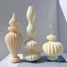 The Fluidform Ribbed Vase Moulds silicone candle mould by MYKA Candles and Moulds, a must-have for jesmonite and resin vessel makers.