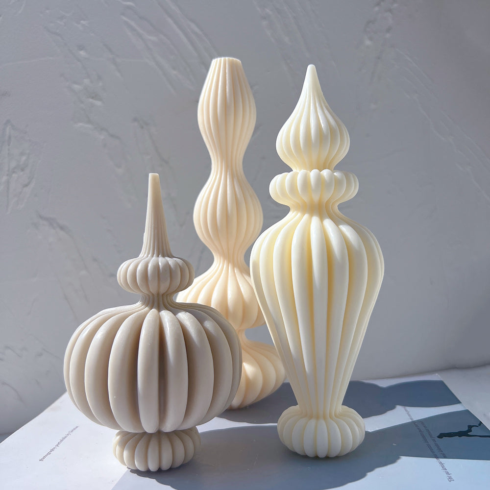 A Fluidform Ribbed Vase Moulds silicone candle mold by MYKA Candles and Moulds, the perfect multipurpose tool for concrete and resin vessel moulds.