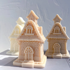 A heat-resistant Gingerbread House Silicone Candle Mould silicone candle mould by MYKA Candles and Moulds, ideal for soap, resin, and baking mould applications.