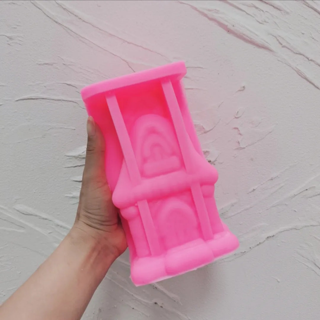 Showcasing the Gingerbread House Silicone Candle Mould silicone candle mould by MYKA Candles and Moulds for creative baking moulds and candle making.