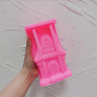 Showcasing the Gingerbread House Silicone Candle Mould silicone candle mould by MYKA Candles and Moulds for creative baking moulds and candle making.