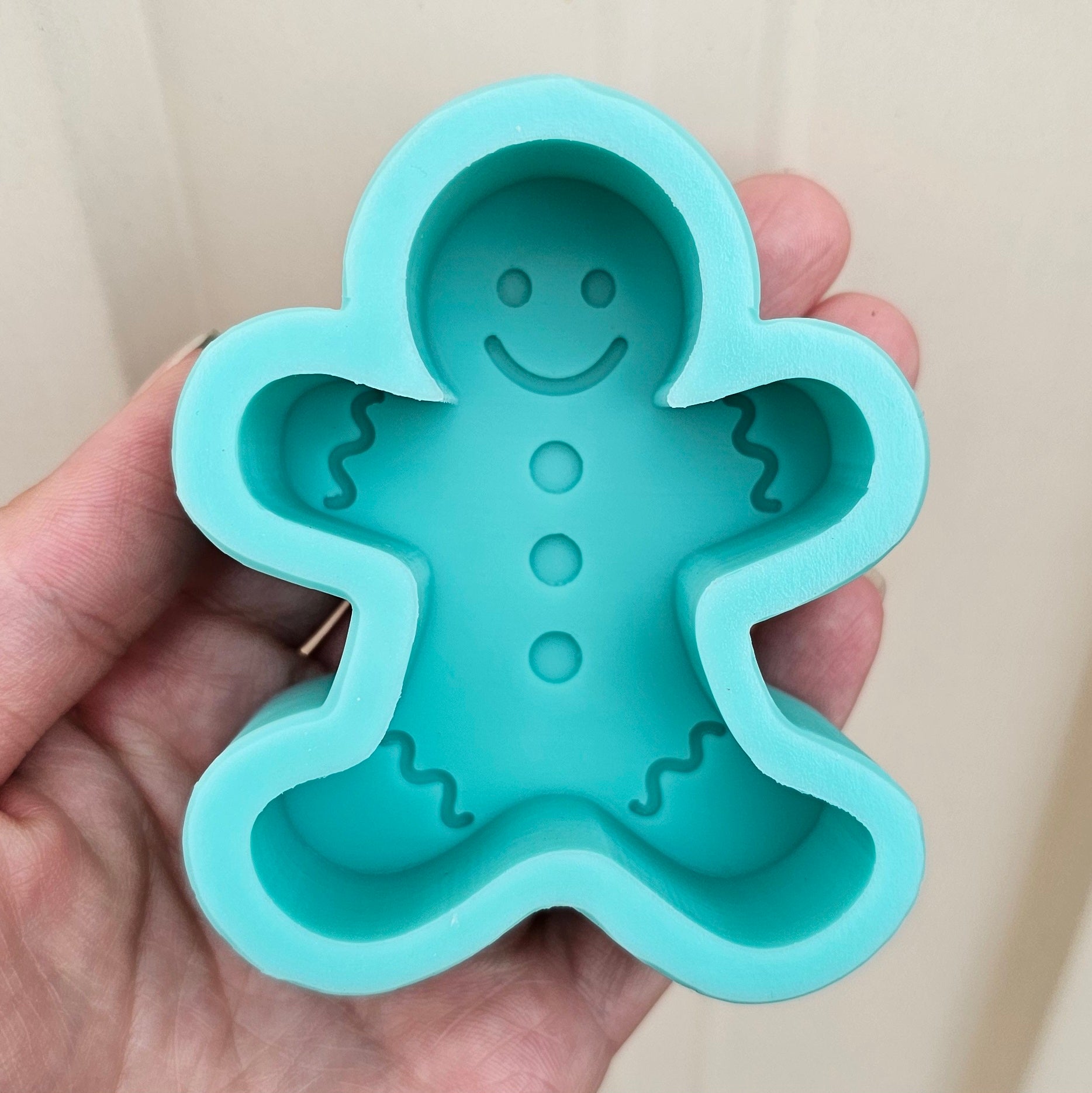 The Gingerbread Man Silicone Candle Moulds silicone candle mould by MYKA Candles and Moulds, perfect for small business candle, soap, and cake mould production.