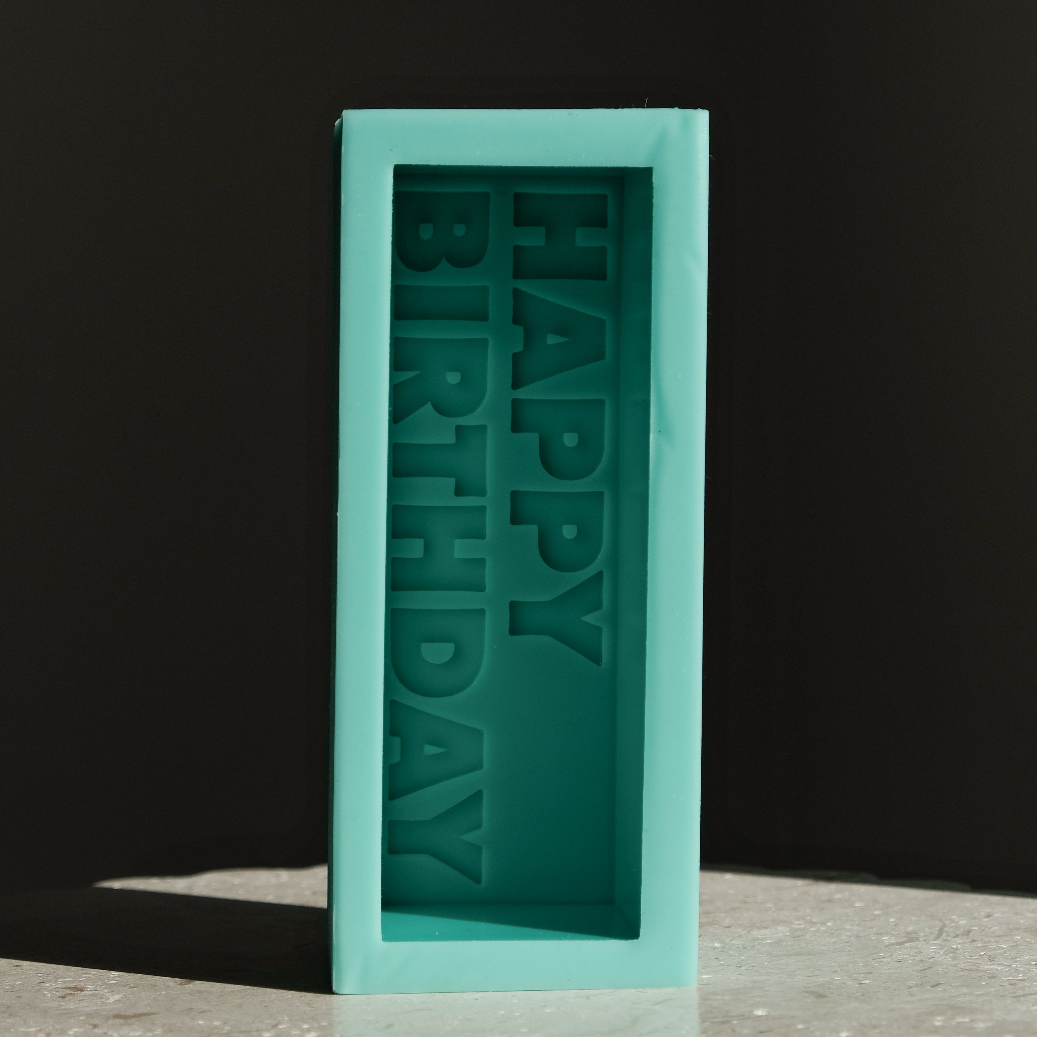 The Happy Birthday Candle Mould silicone candle mould by MYKA Candles and Moulds, perfect for small business candle, soap, and cake mould production.