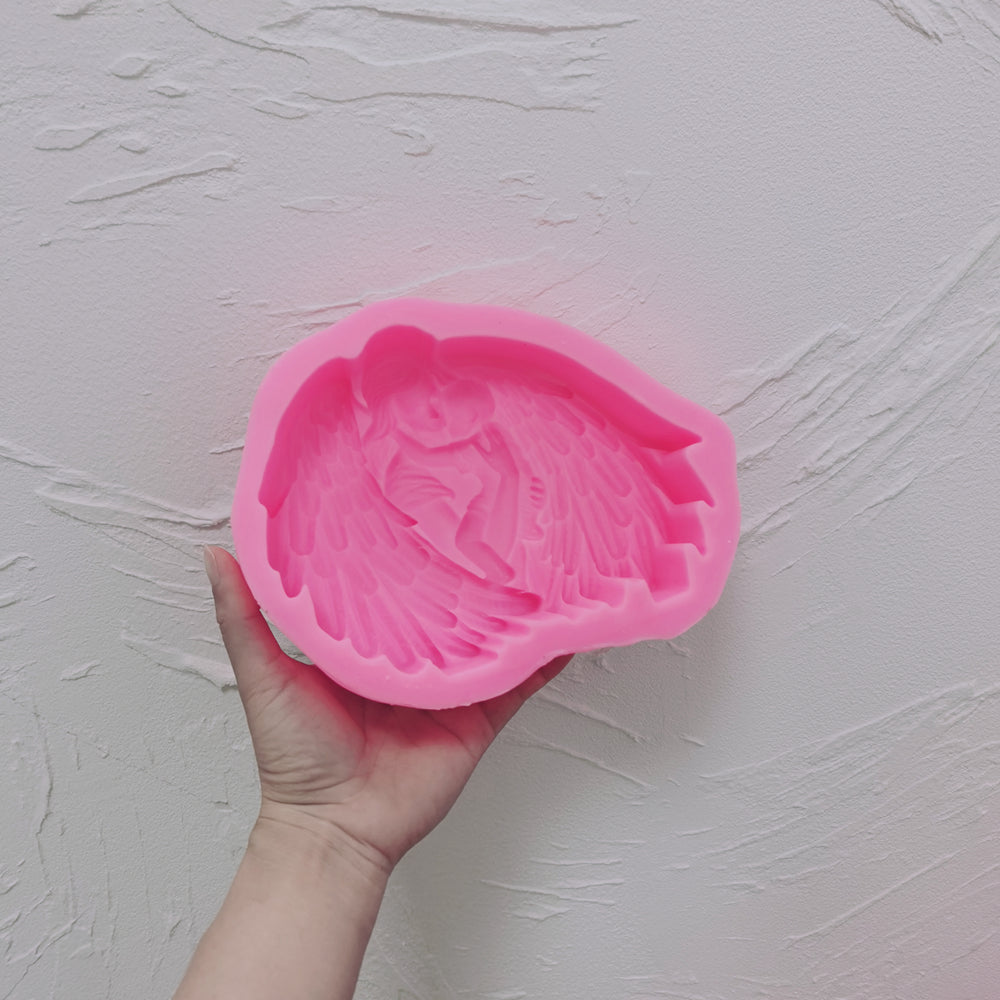 Showcasing the Heavenly Embrace Candle Mould silicone candle mould by MYKA Candles and Moulds for creative baking moulds and candle making.