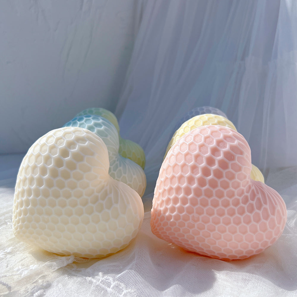 The Honeycomb Heart Candle Mould silicone candle mould by MYKA Candles and Moulds, a top choice for artistic resin moulds and baking moulds.