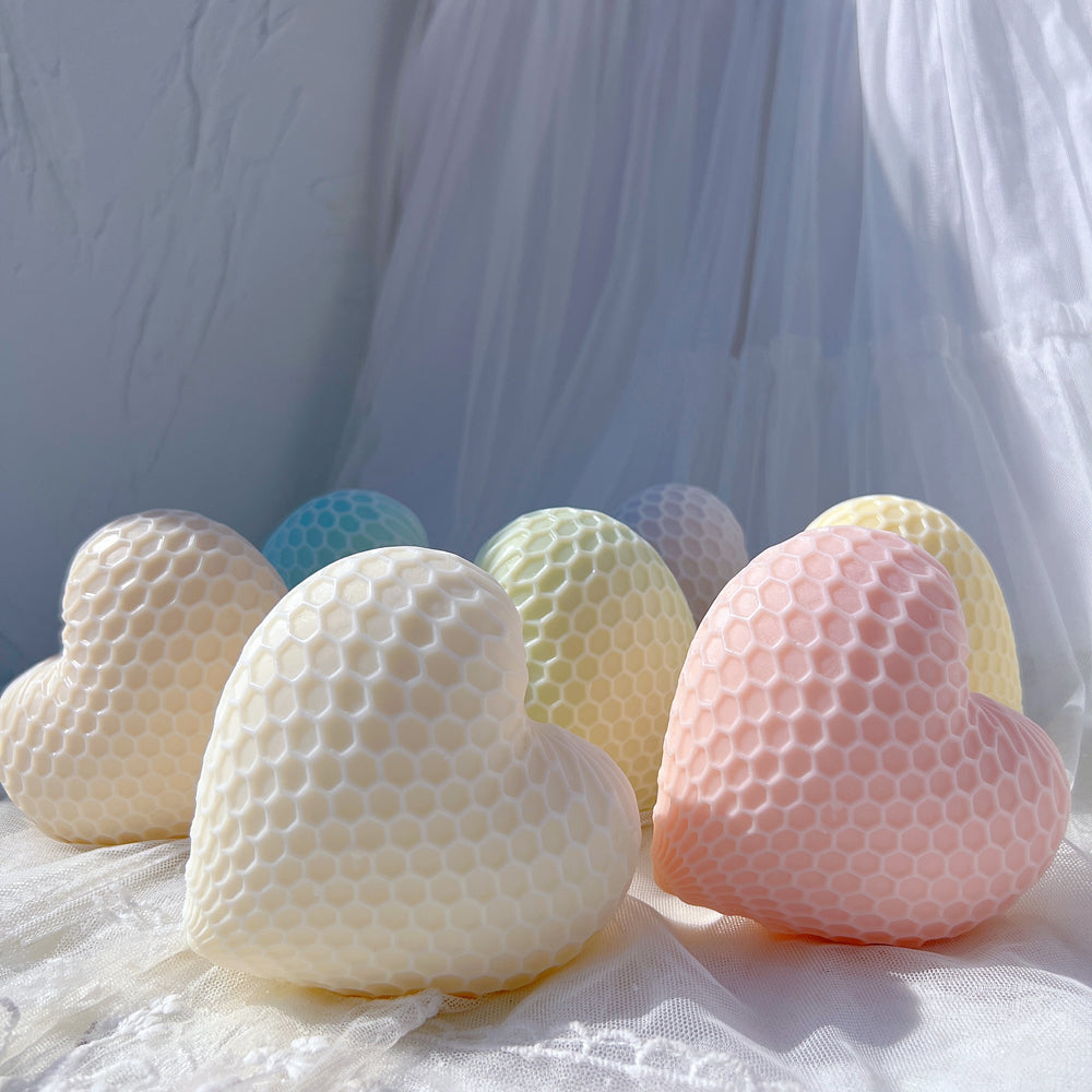 A high-performance Honeycomb Heart Candle Mould silicone candle mold from MYKA Candles and Moulds for resin art and professional baking mould use.