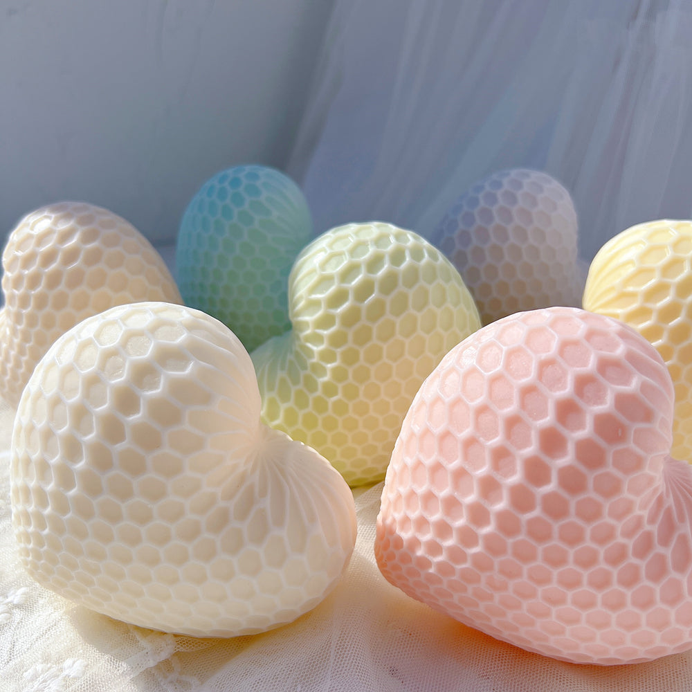 The Honeycomb Heart Candle Mould silicone candle mould by MYKA Candles and Moulds, a must-have for resin moulds and DIY baking mould enthusiasts.