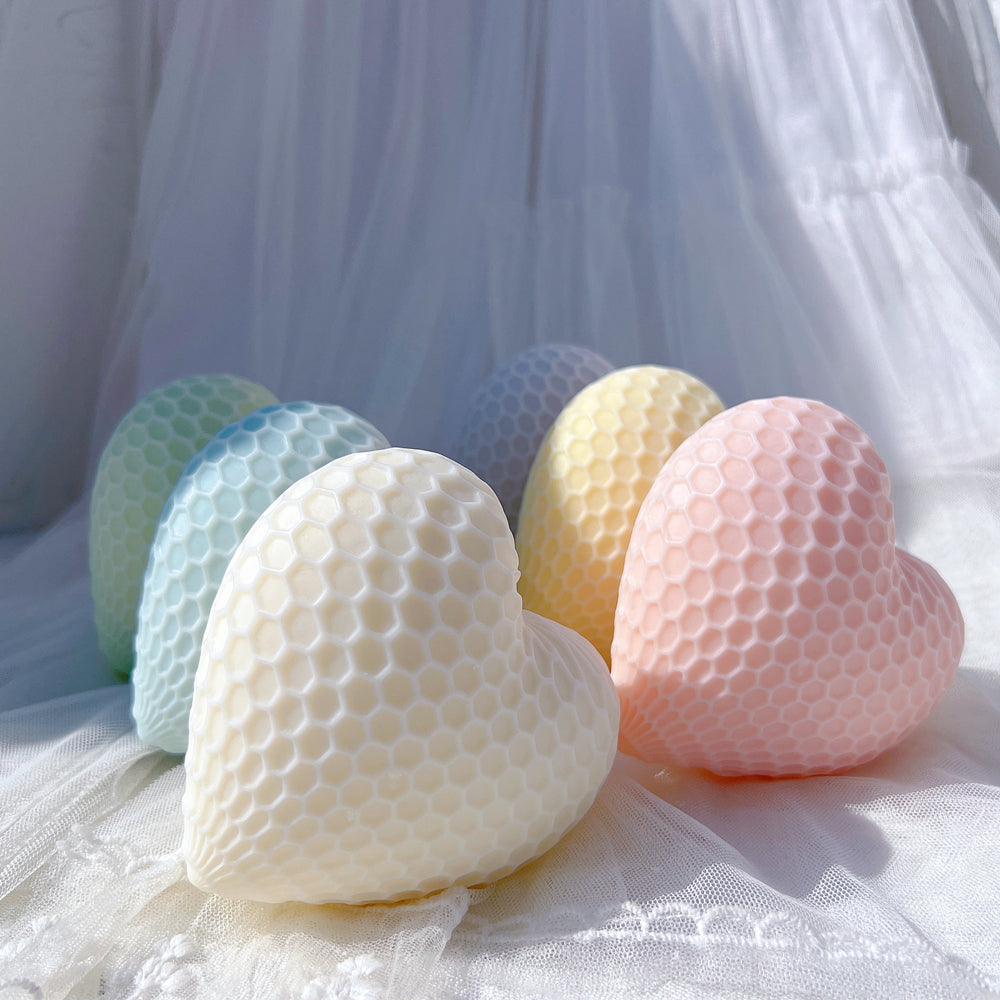 Showcasing the Honeycomb Heart Candle Mould silicone candle mould by MYKA Candles and Moulds for creative baking moulds and candle making.
